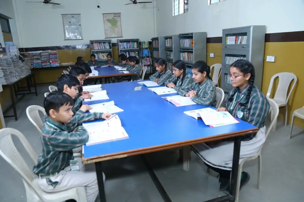 Student Group study session of students at Narnaul best school library