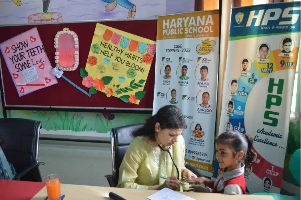 Dental health awareness activity for students at school campus
